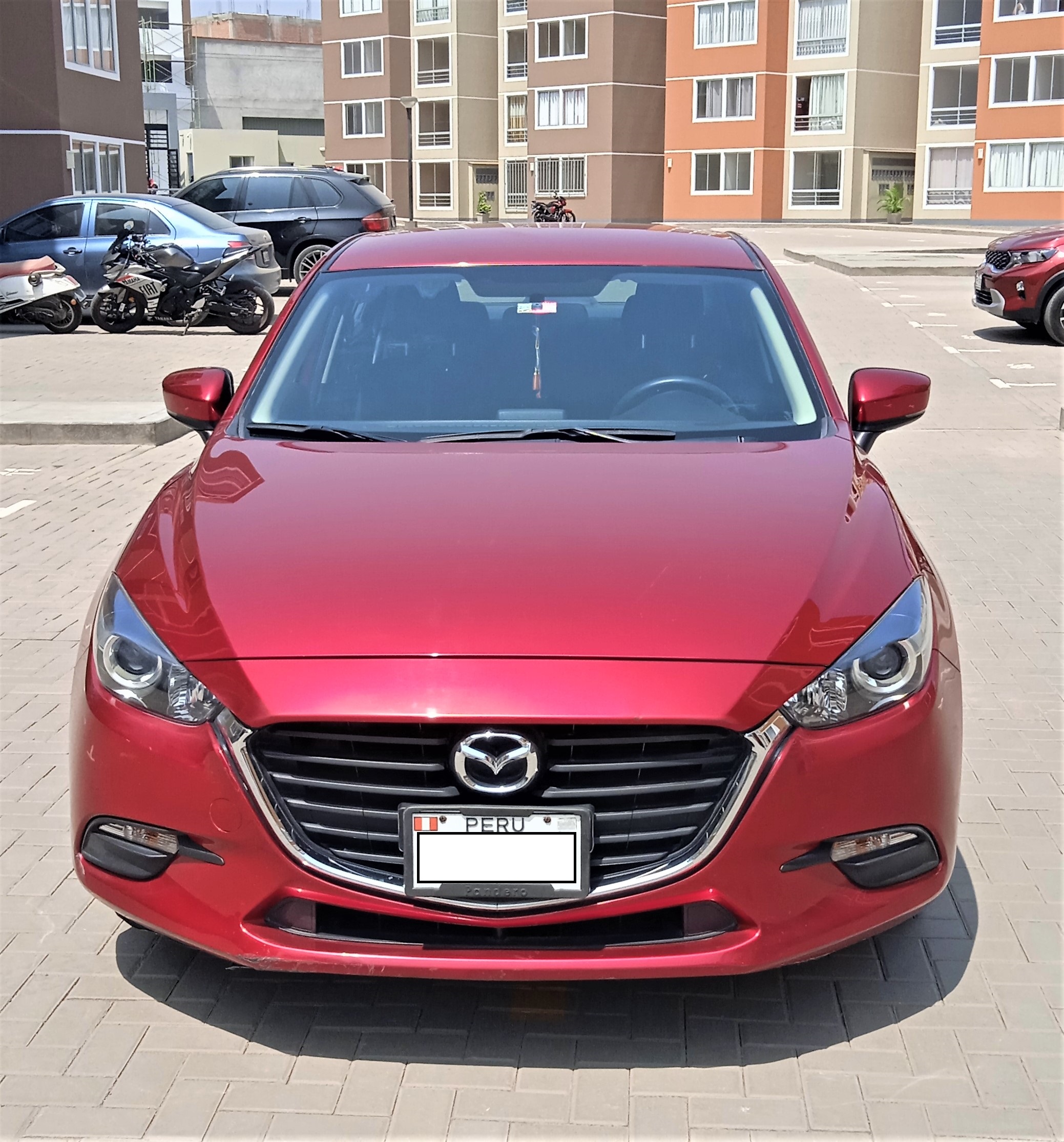 Mazda 3 sedan AT 1.6 – rojo cristal